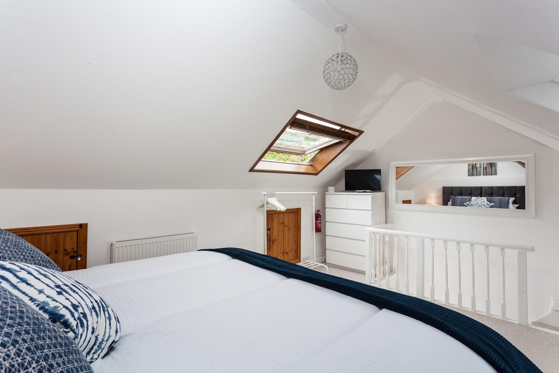 Perch on the headboard, while you watch the morning programmes.