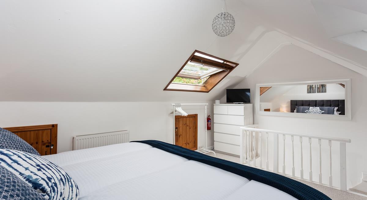 Perch on the headboard, while you watch the morning programmes.