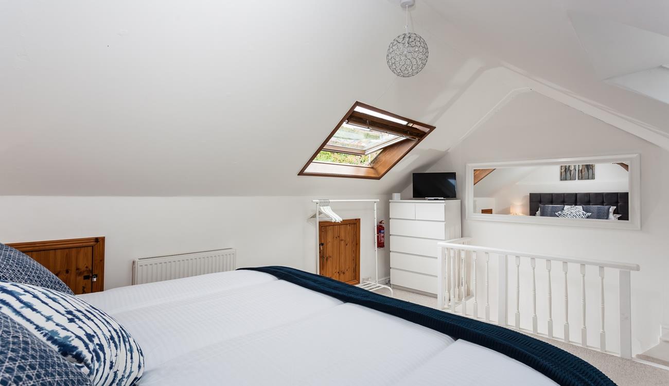 Perch on the headboard, while you watch the morning programmes.