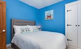Feel the seaside vibes in this bedroom with its nautical theme and colours. - Thumbnail Image