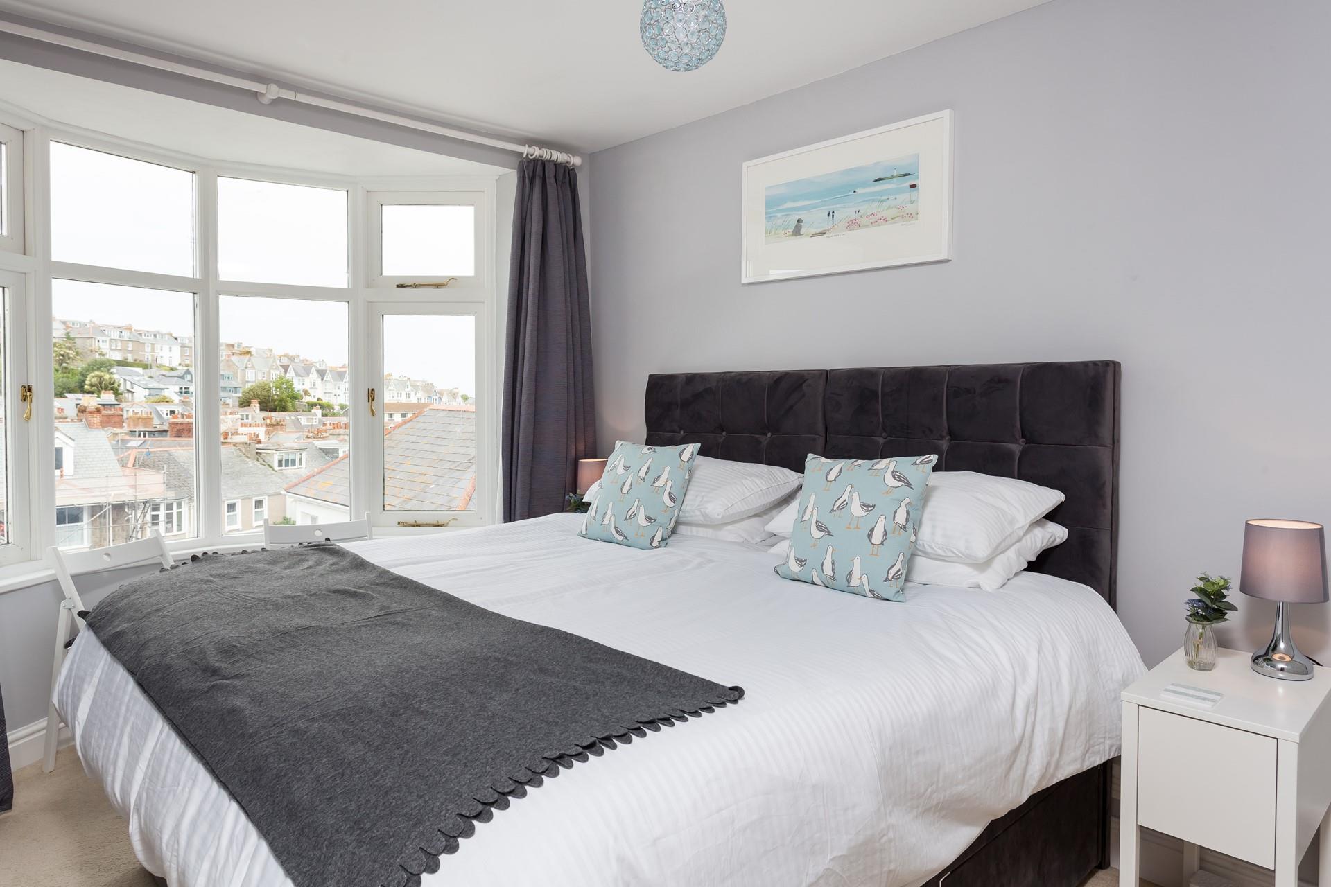 Take a seat and check out the sea glimpses from this bay window.