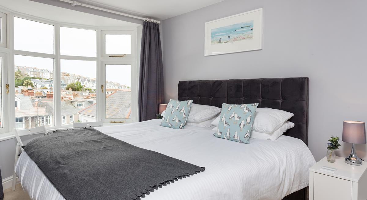 Take a seat and check out the sea glimpses from this bay window.