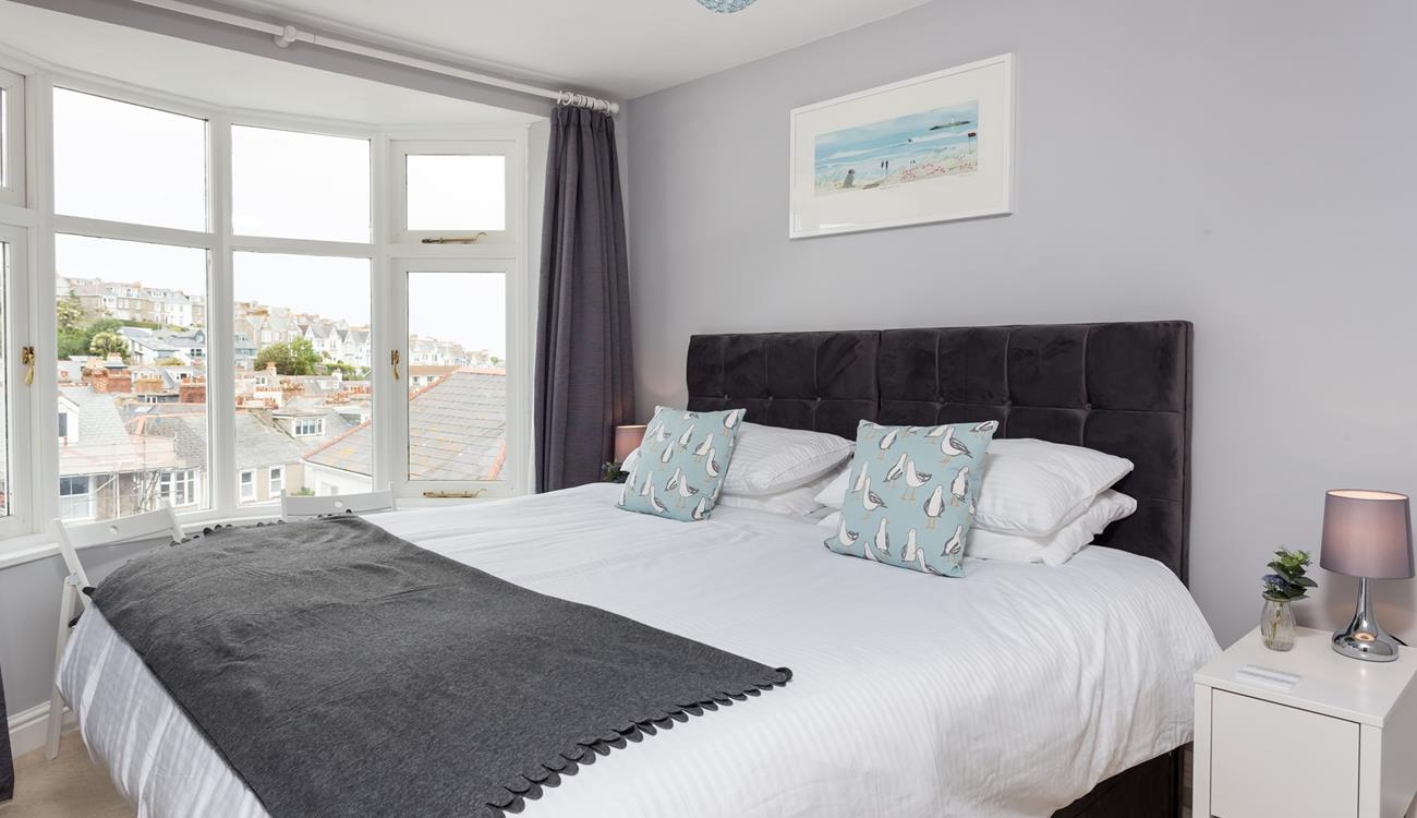 Take a seat and check out the sea glimpses from this bay window.