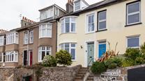 3 Trenwith Place is beautifully decorated making use of effective colours such as the green front door.