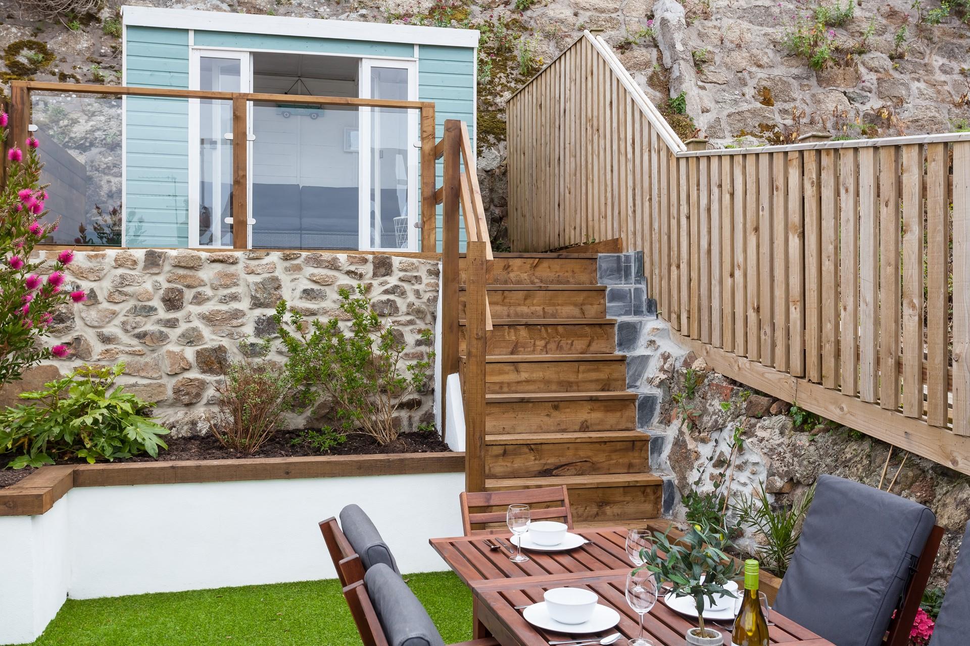 The borders are wonderfully maintained in this enclosed space.