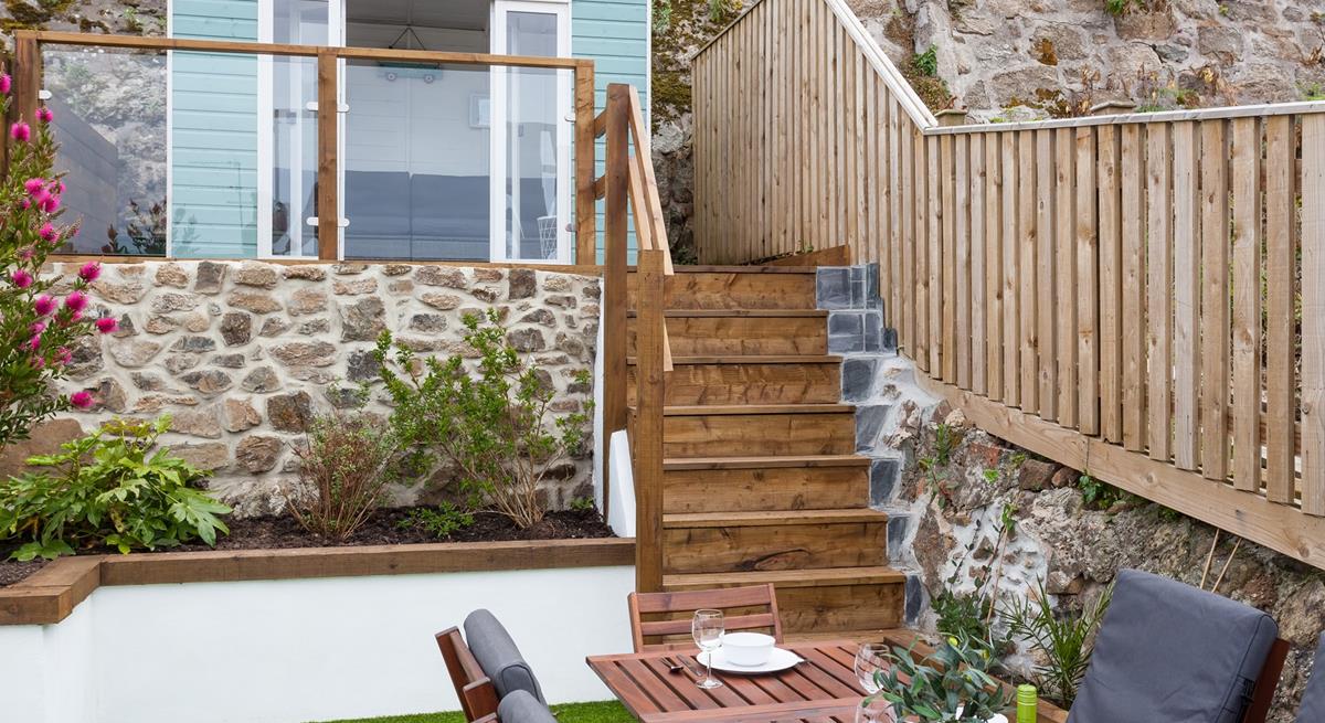 The borders are wonderfully maintained in this enclosed space.