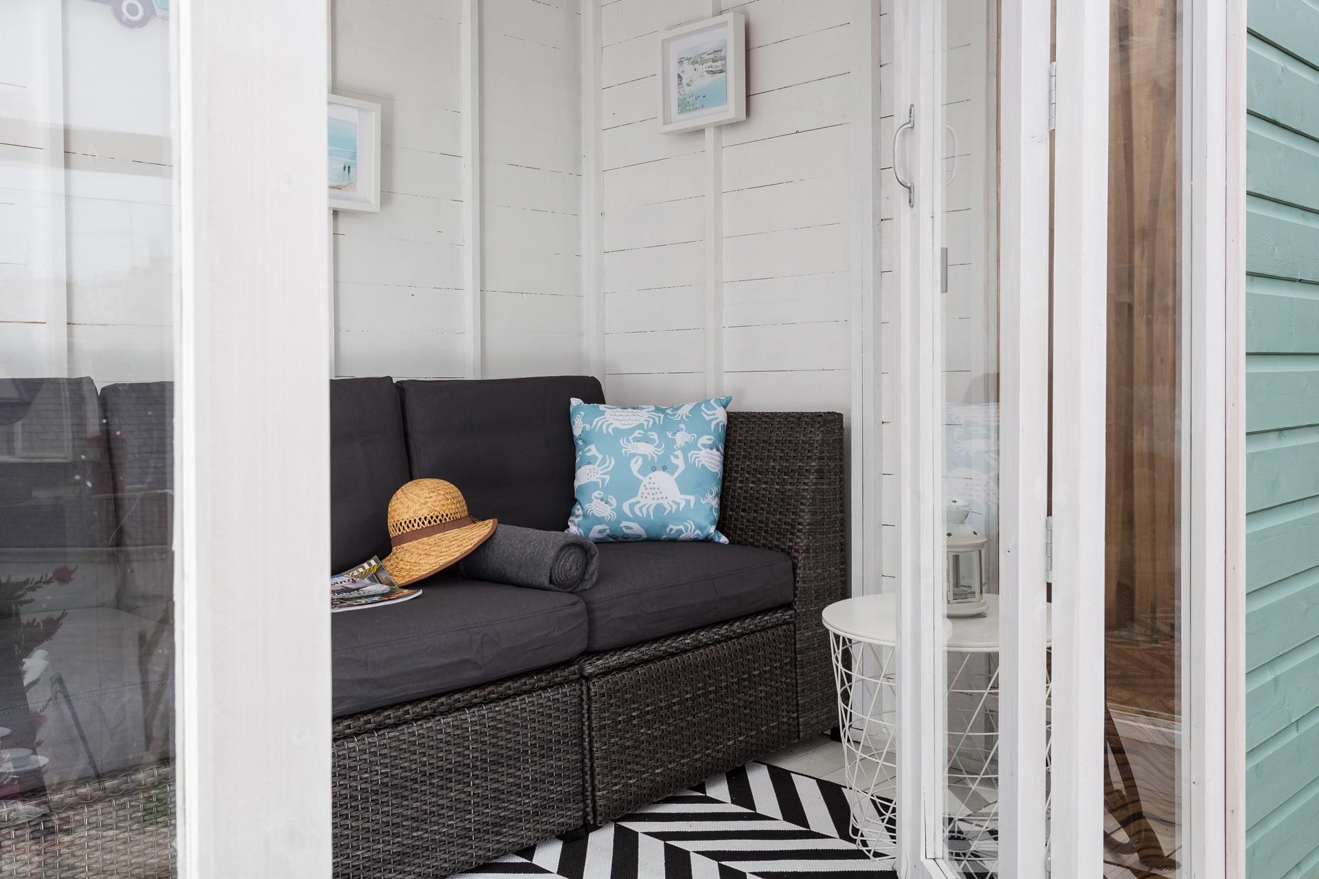 Open the double French doors and let the seaside air drift in.