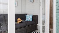 Open the double French doors and let the seaside air drift in.