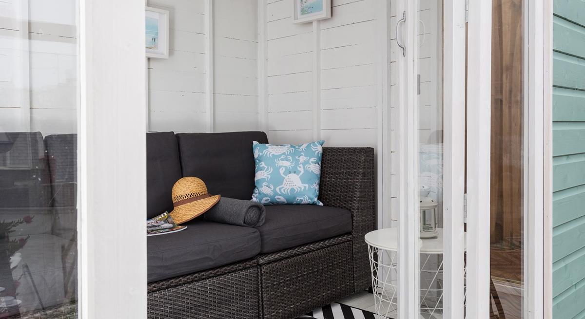 Open the double French doors and let the seaside air drift in.