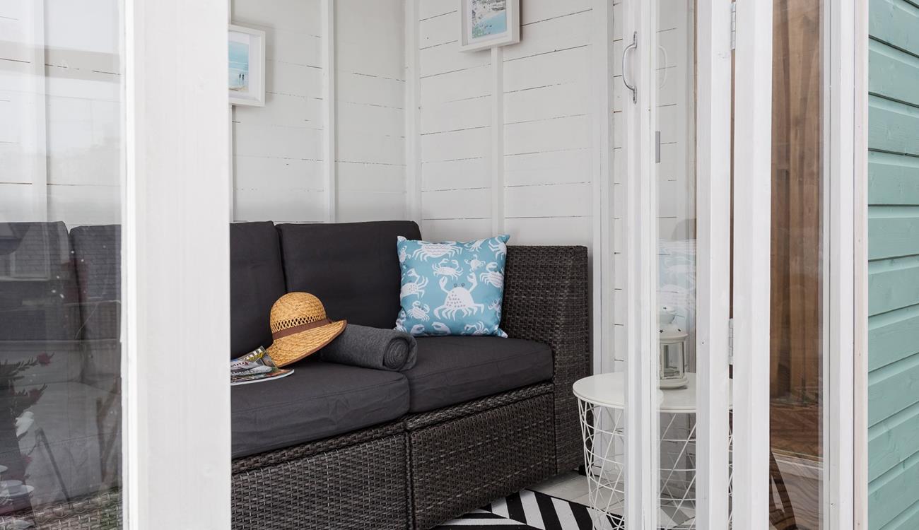 Open the double French doors and let the seaside air drift in.