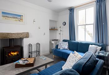 Light the wood burner and bring out the board games for a cosy afternoon in this comfortable sitting room.