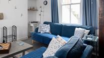 Sink into the sofa and enjoy a game night with the family around you.