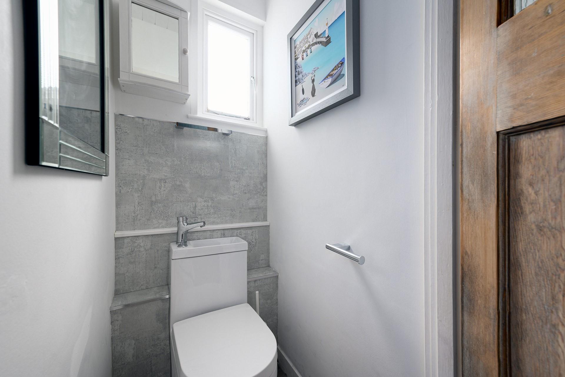 There is an additional WC in the cloakroom.