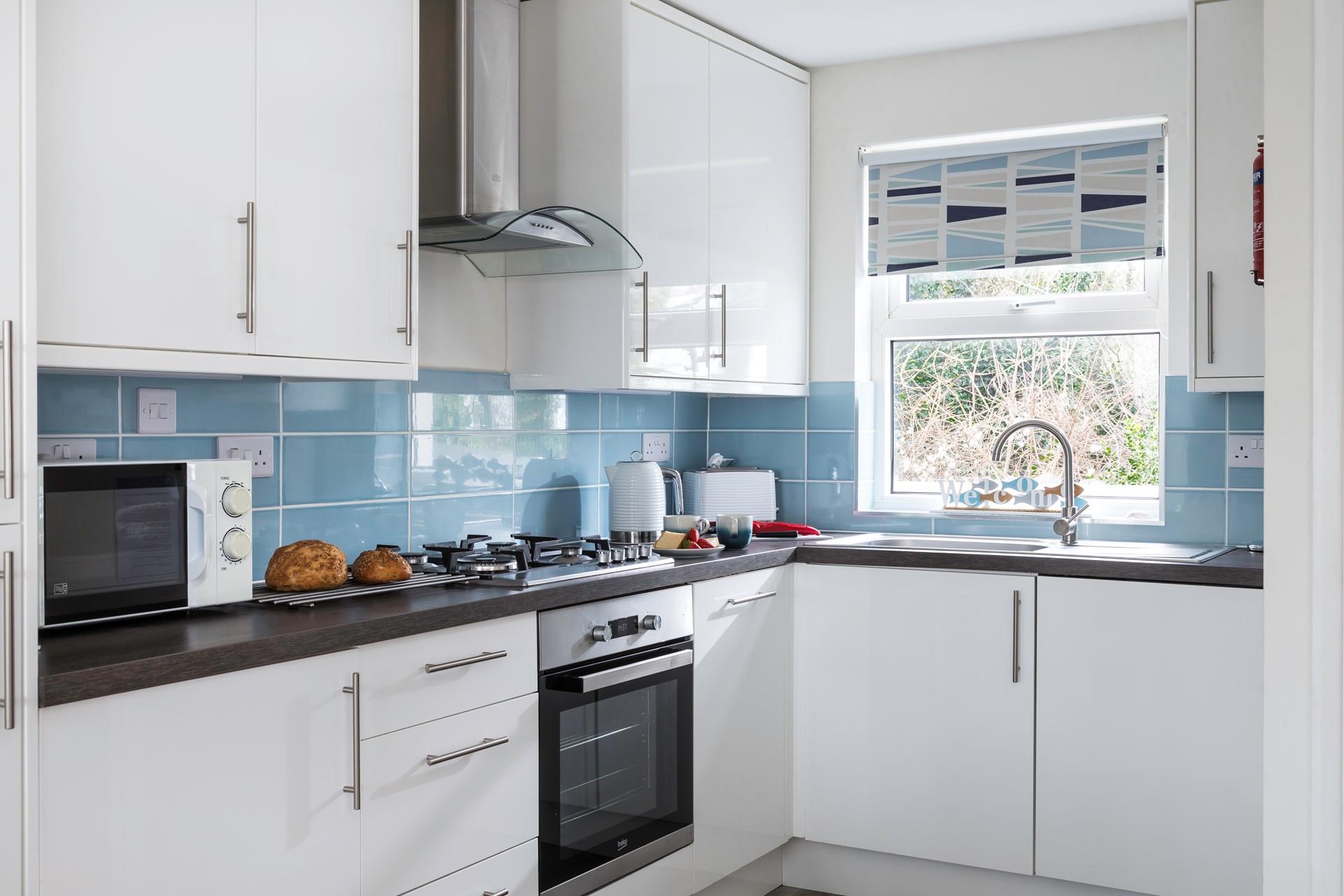 Sleek and modern appliances make it easy to cook delicious meals for your loved ones.