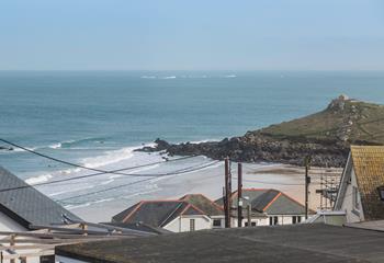 Spend sunny days on beautiful Porthmeor beach.