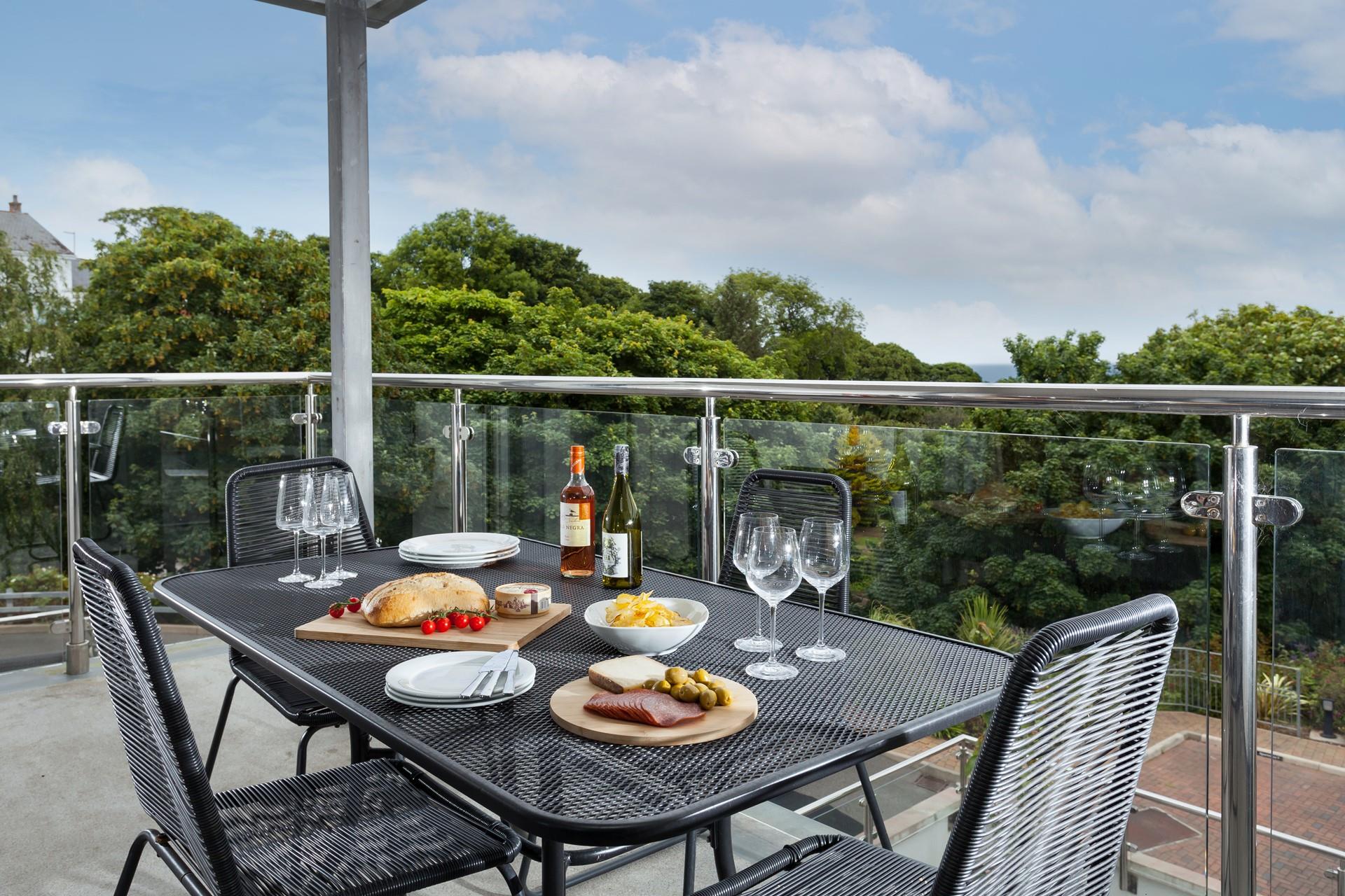 Enjoy long lazy lunches out of the balcony in the warm summer months.