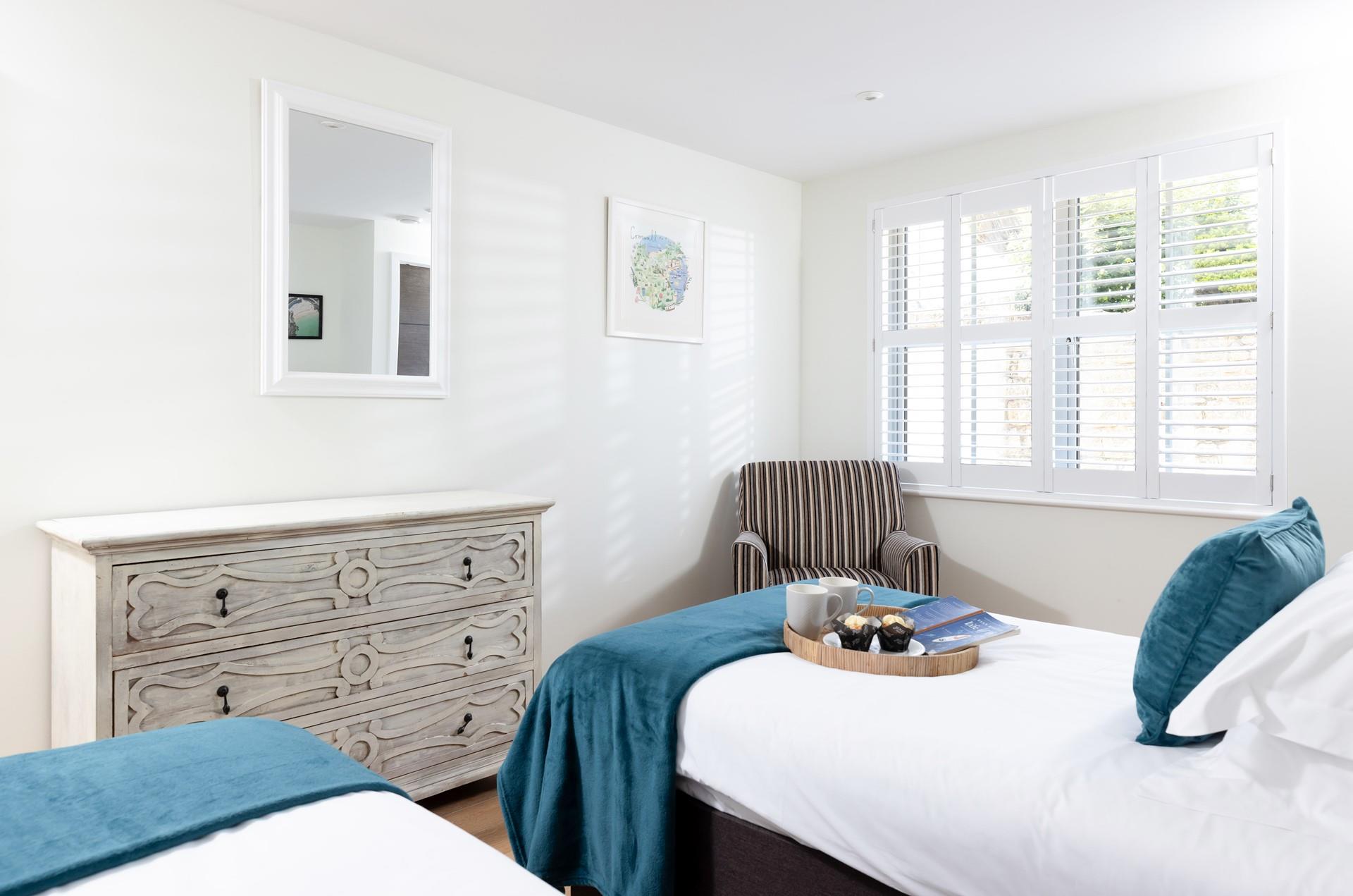 The large window allows plenty of natural light to filter through. 
