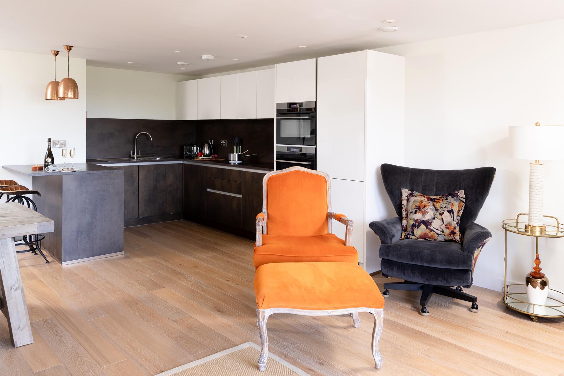 The open-plan kitchen area is perfect for socialising while the chef cooks up a feast!