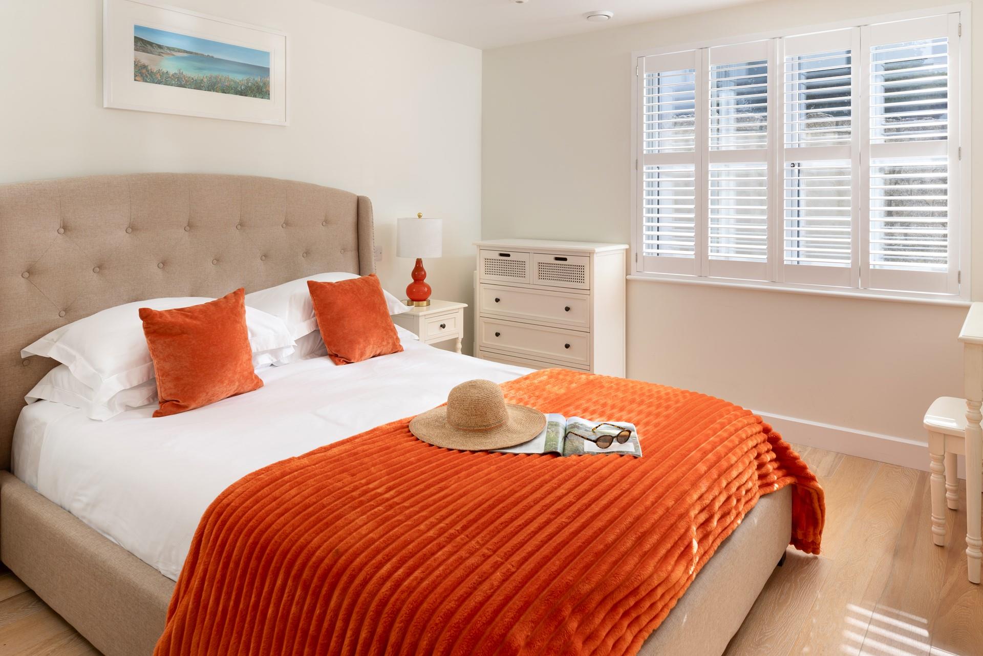 Sink into the luxurious bed for a dreamy night's sleep.