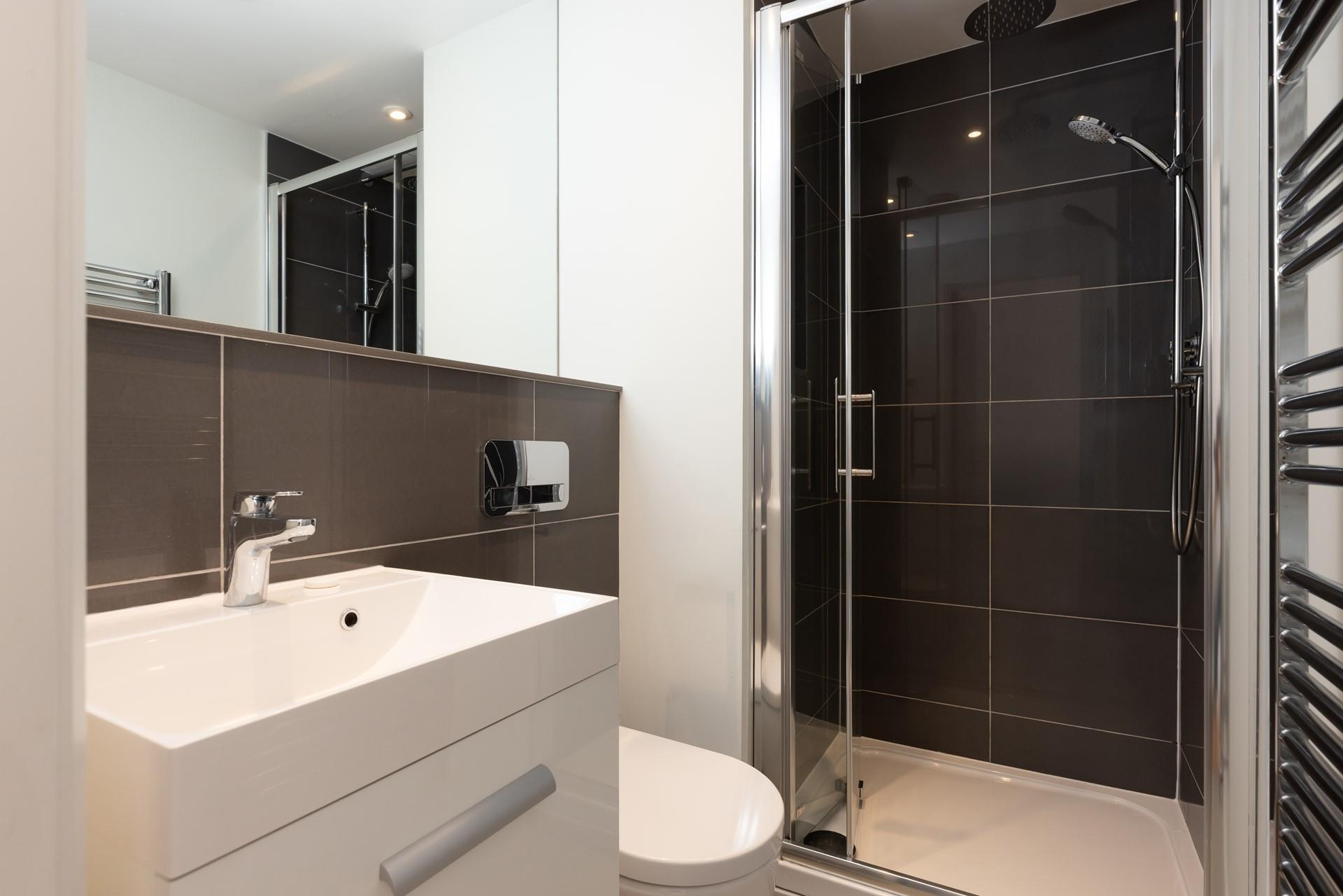 The ensuite bathroom is the perfect place to get ready for the day. 