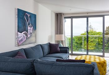 Beautifully finished, the apartment features contemporary artwork and modern furnishings.