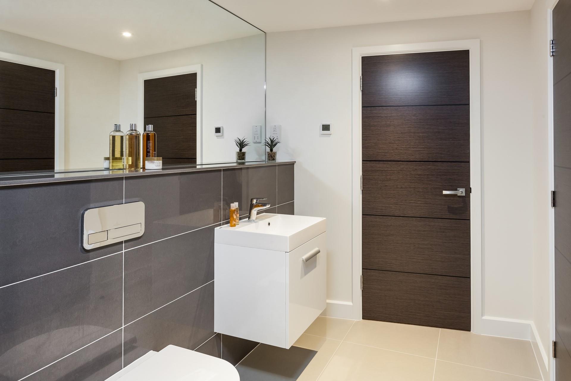 We love the design of the contemporary bathrooms at Bosun's Whistle. 