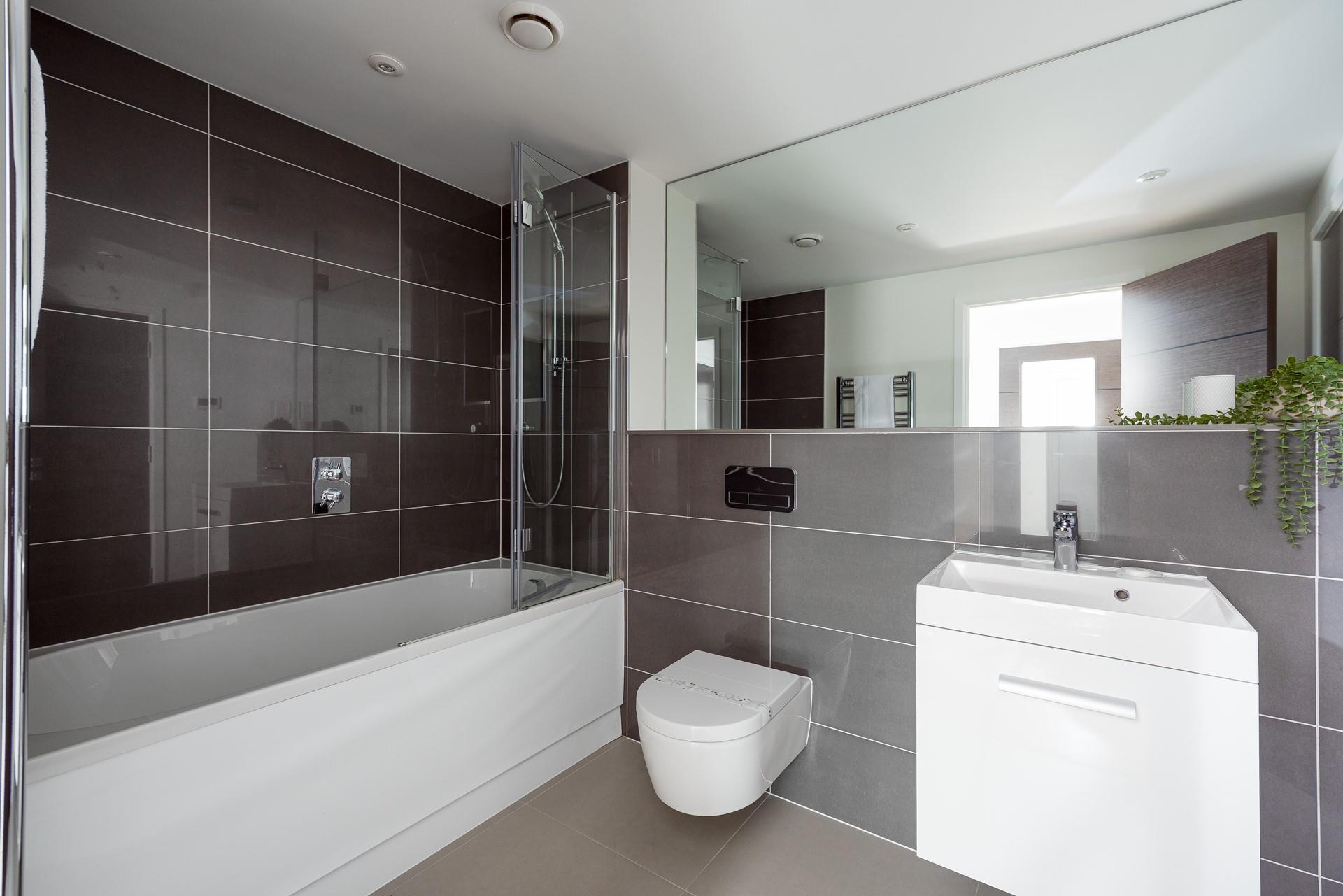 After a busy day exploring Cornwall, unwind with a soak in the stylish bathroom. 