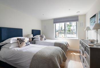 Light, spacious and airy, the twin room has plenty of space for two adults or children sharing. 