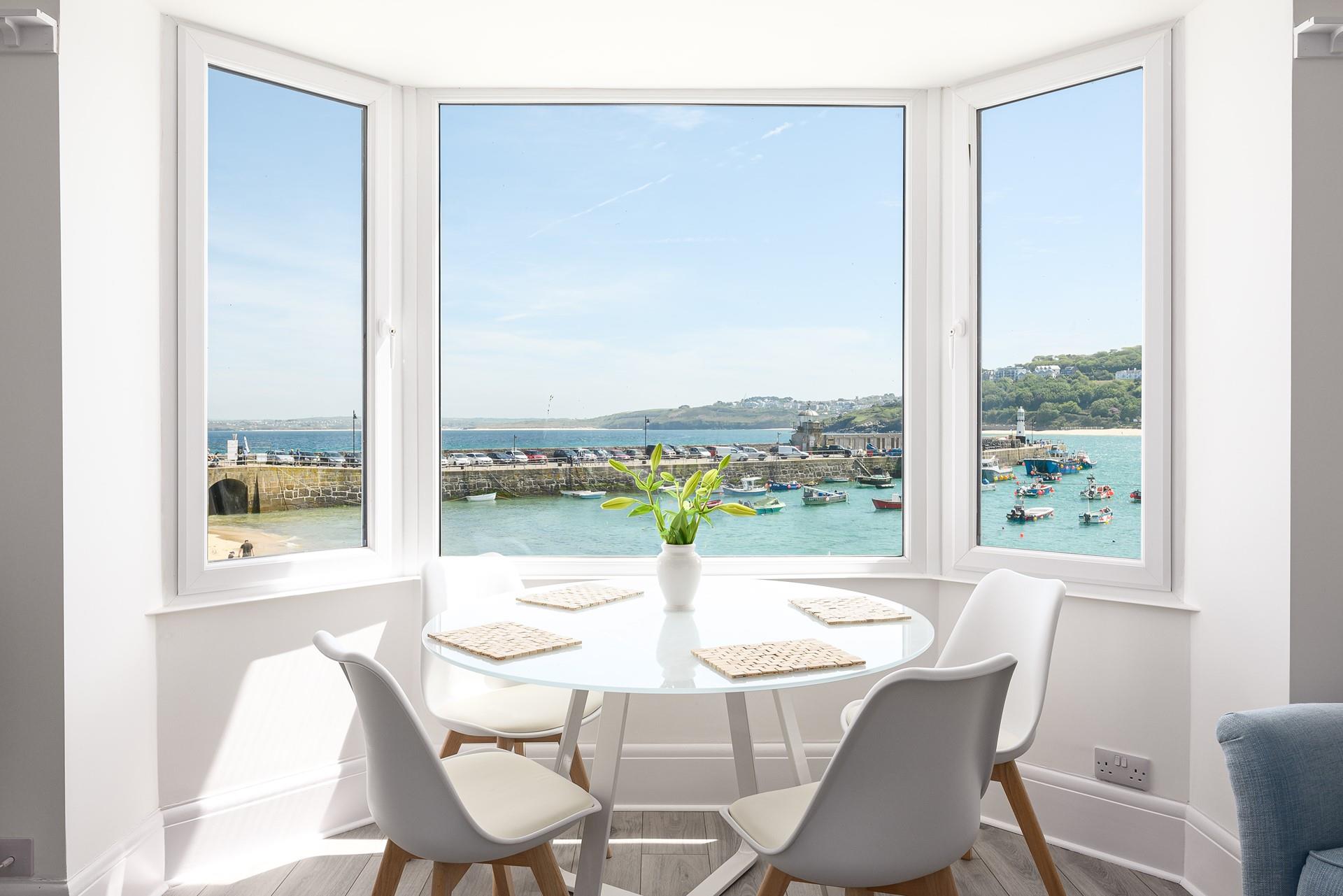 Watch the boats bobbing on the harbour while you eat your breakfast.