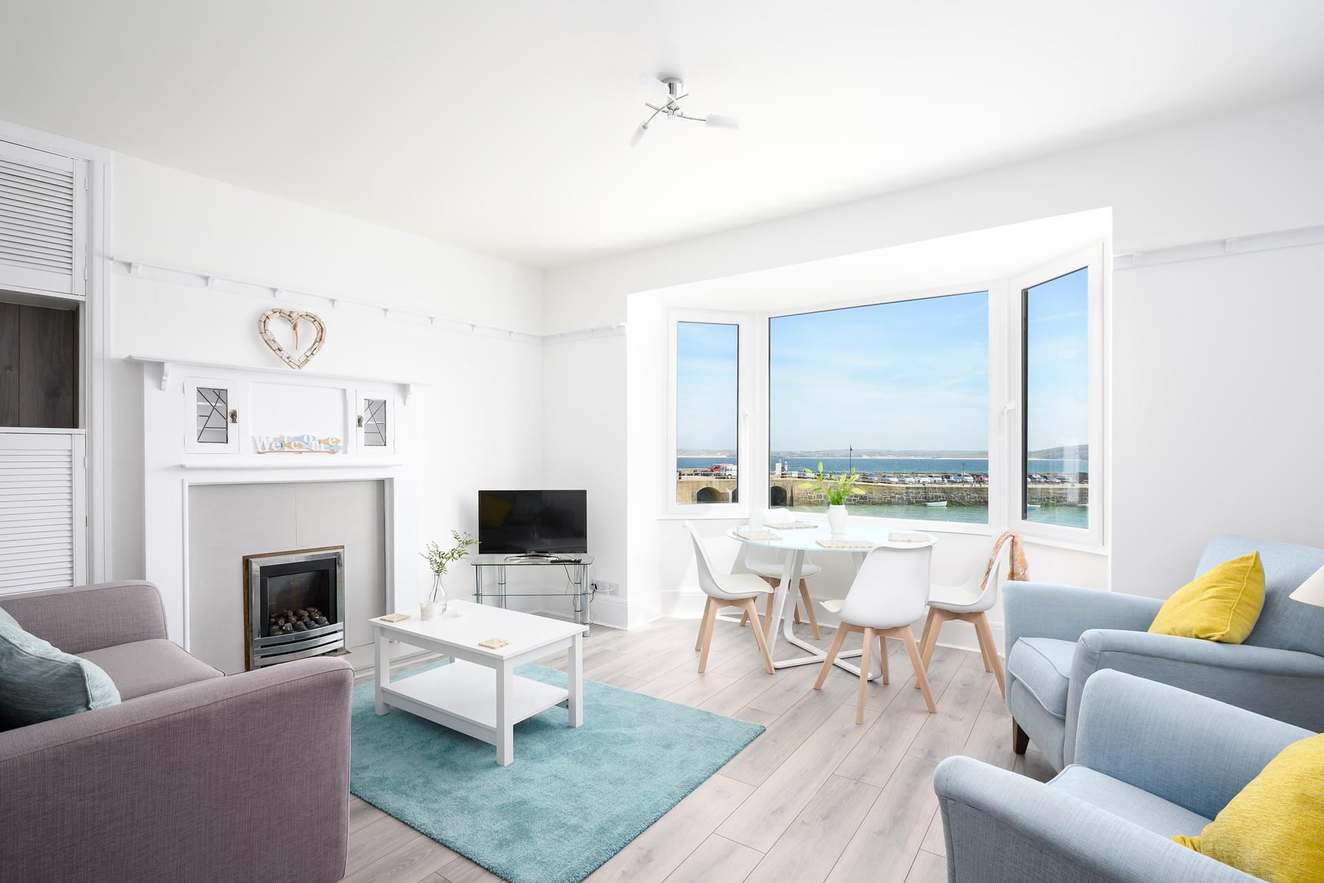 Watch the comings and goings on the pier while you plan which is St Ives many beaches to visit today.