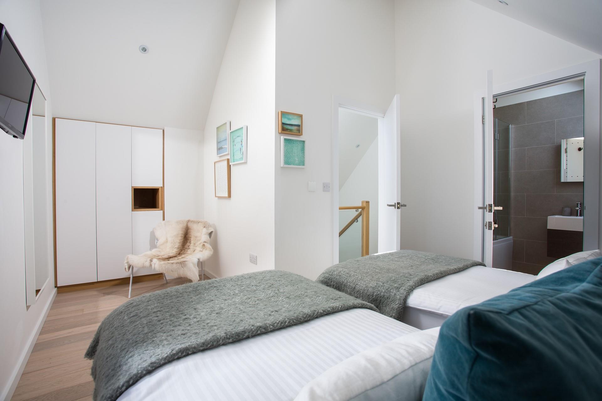 Wake up and wander out to the en suite to get ready for the day.