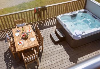 Spend long lazy afternoons on the decking dipping in and out of the hot tub.