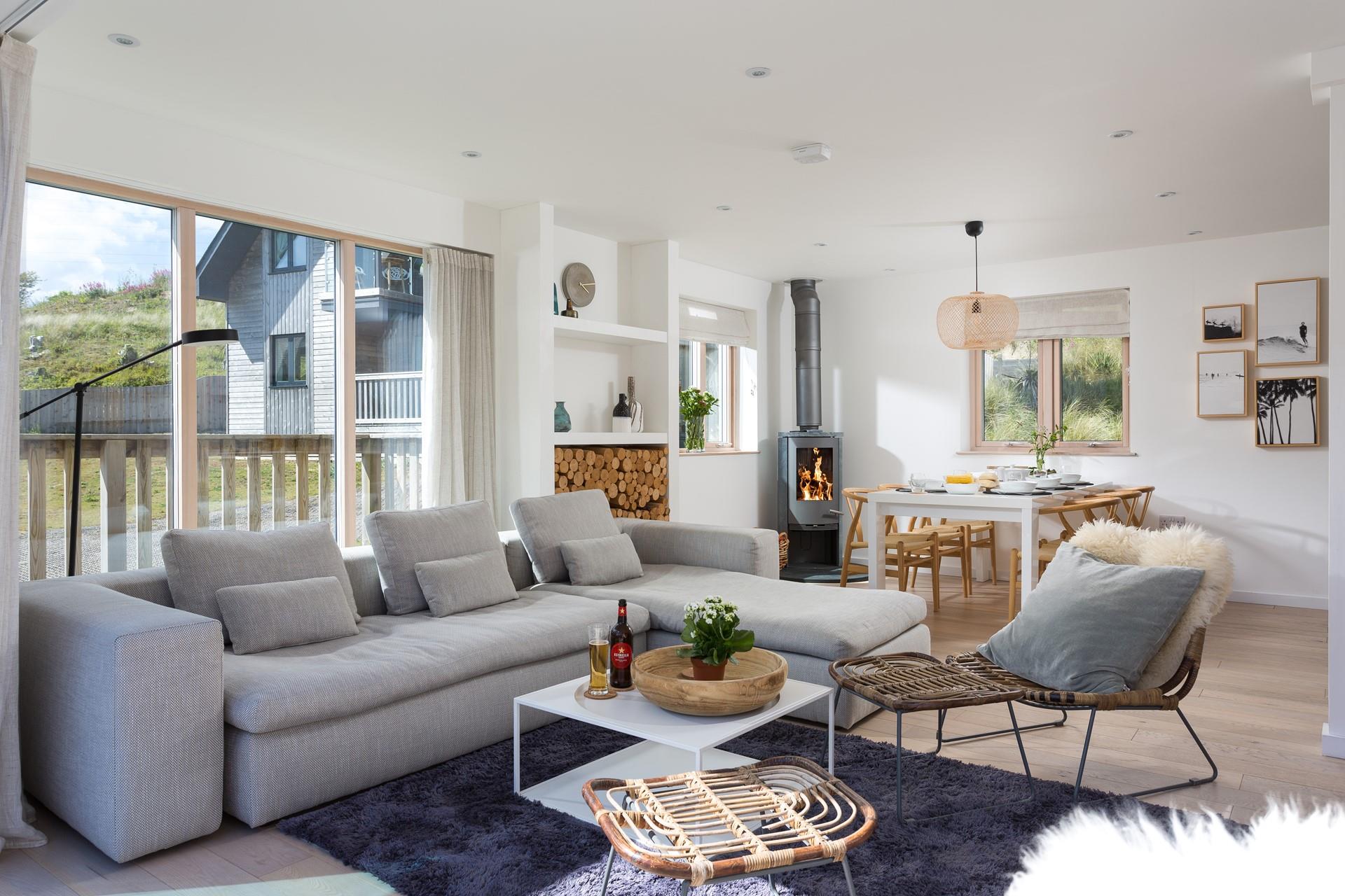 Relax in your cosy living room with a glass of something cold.