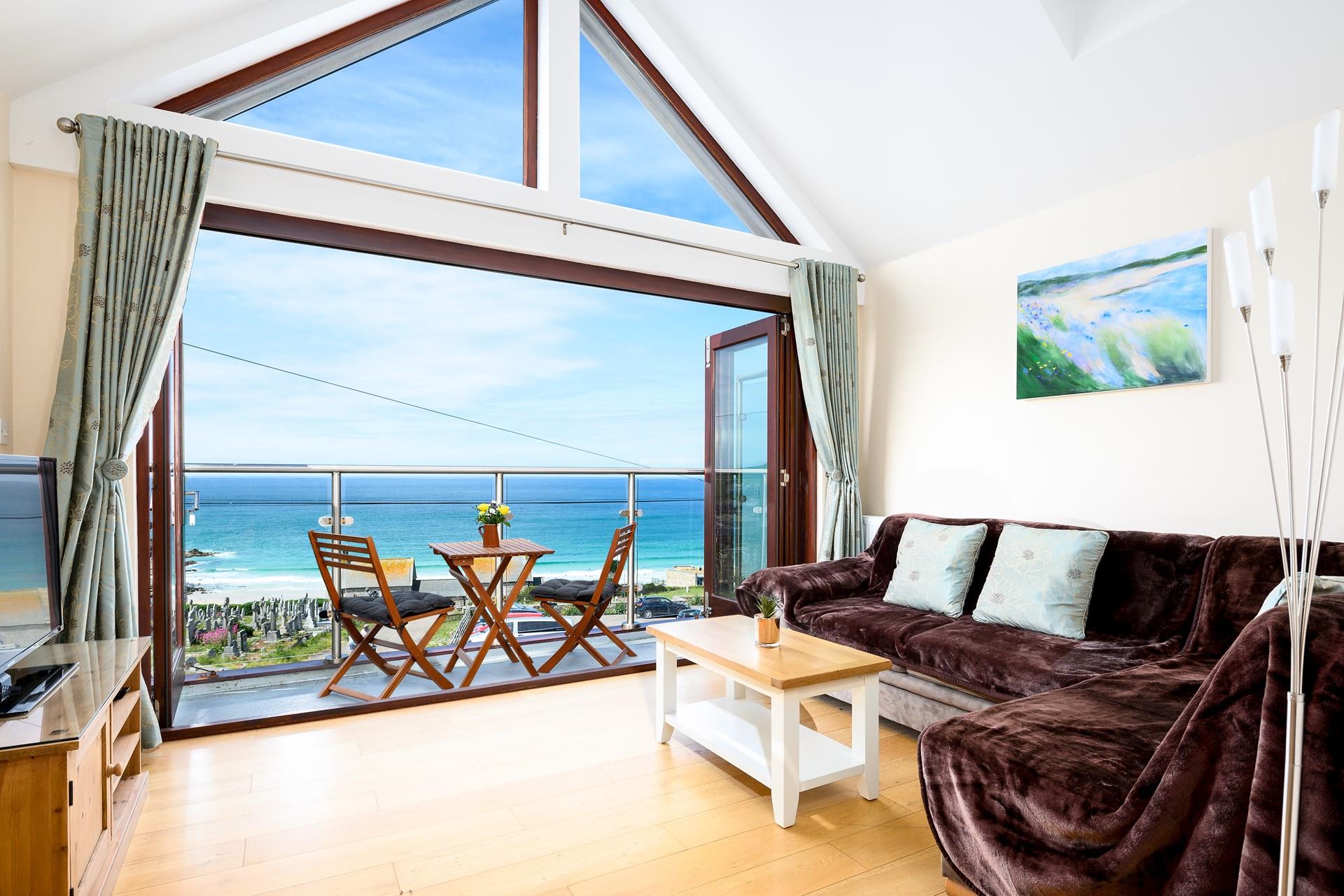 On summer afternoons throw open the doors and let in the fresh sea air.