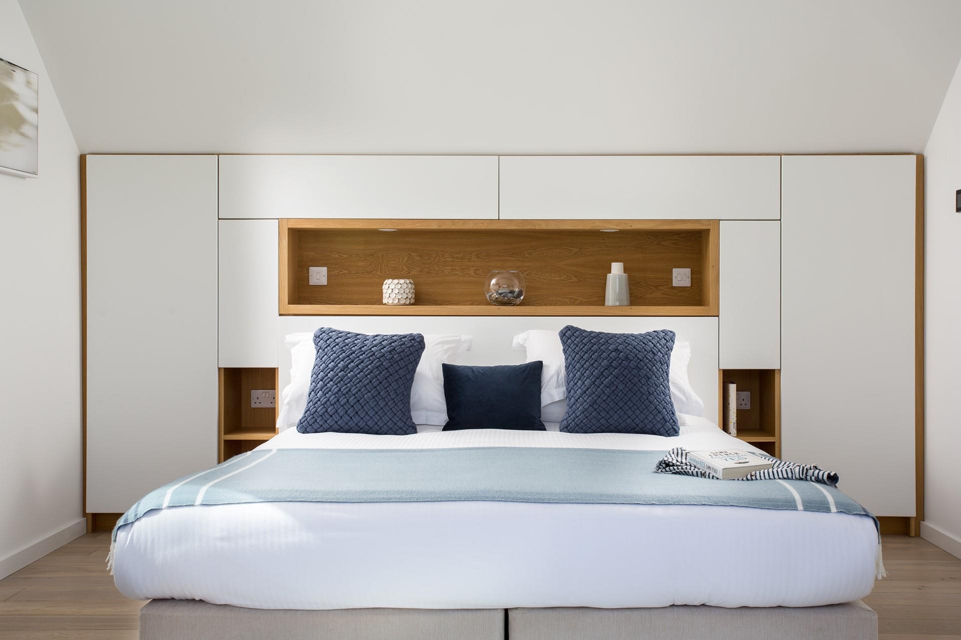 Climb into bed with a good book to read before drifting off to sleep.