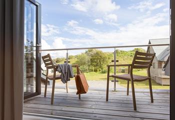 As well as the large decking downstairs, there is a balcony upstairs to sit and soak up the sun in.