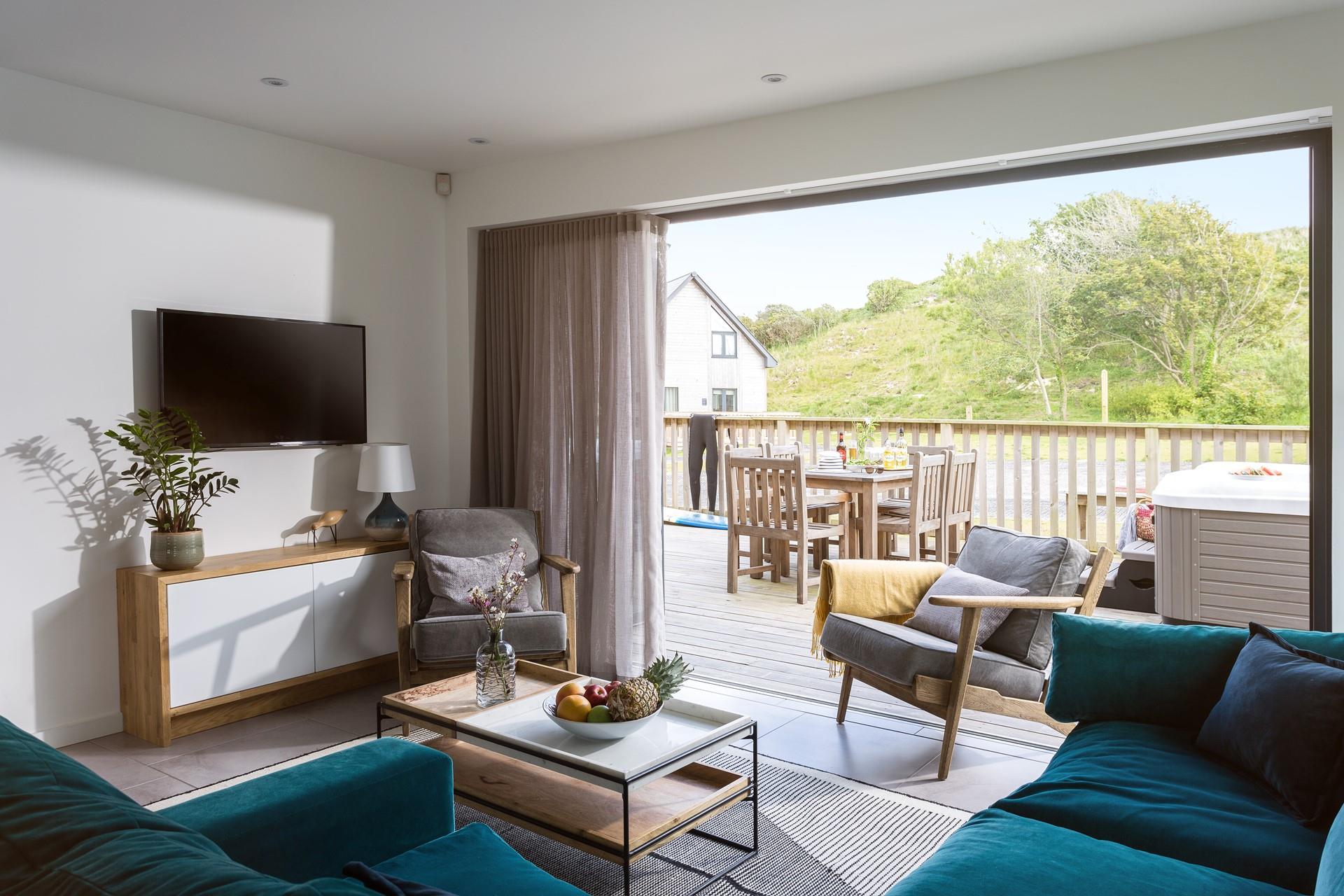 The open plan light-filled living space is perfect for those hot summer days.