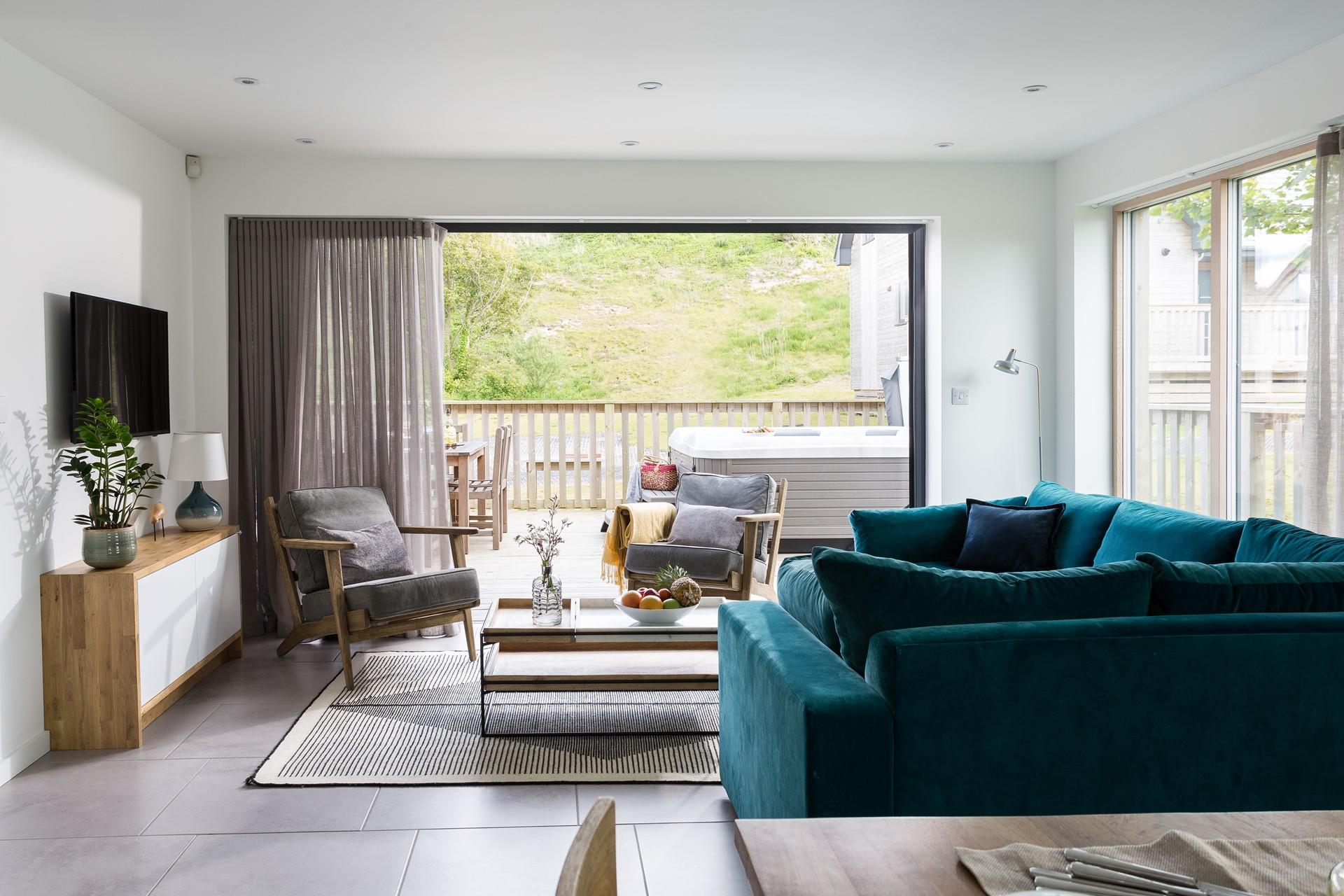 A dip in the hot tub is the perfect way to end the day, with a glass of wine in hand.