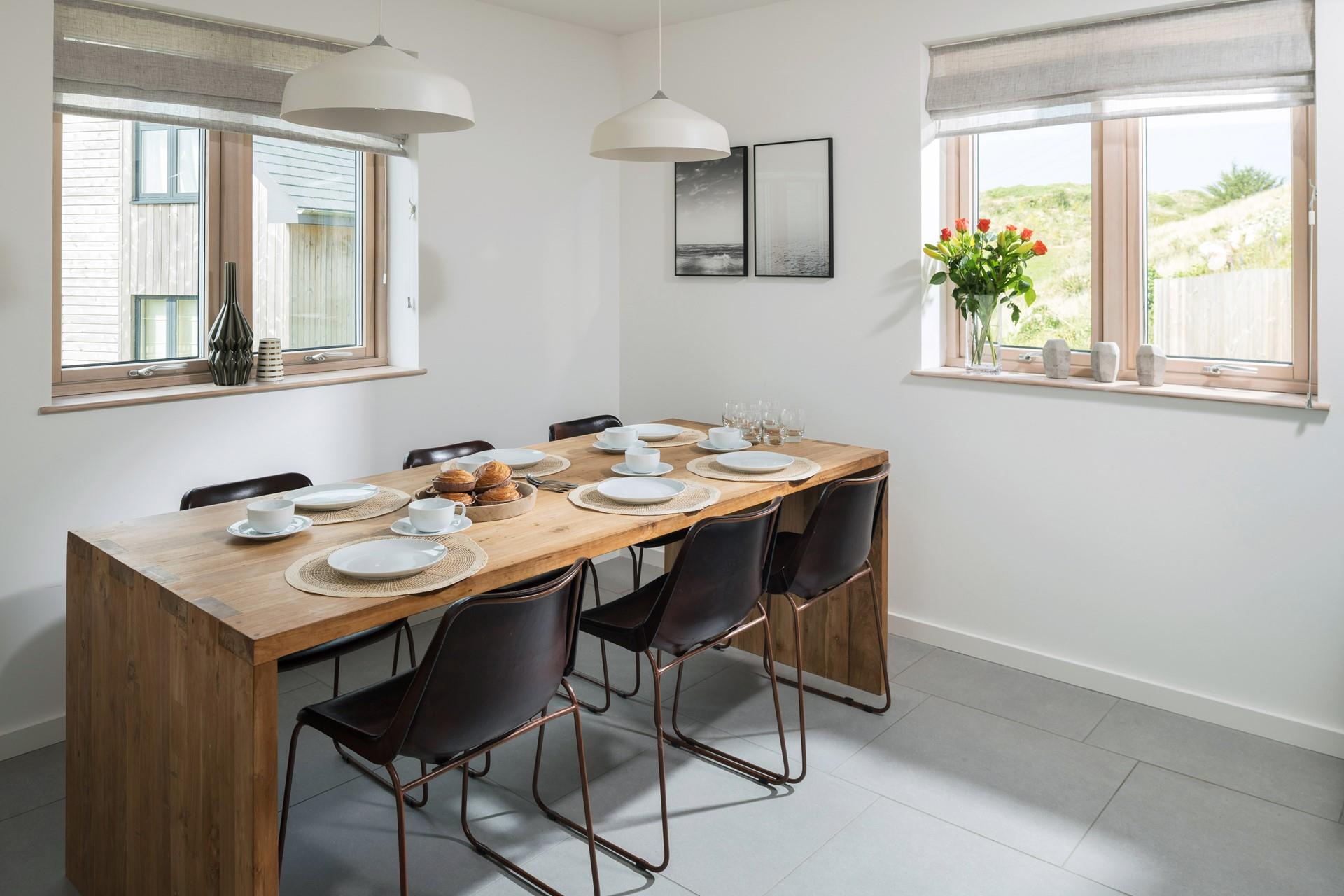 Gather together around the dining table, tucking into warm pastries for breakfast.