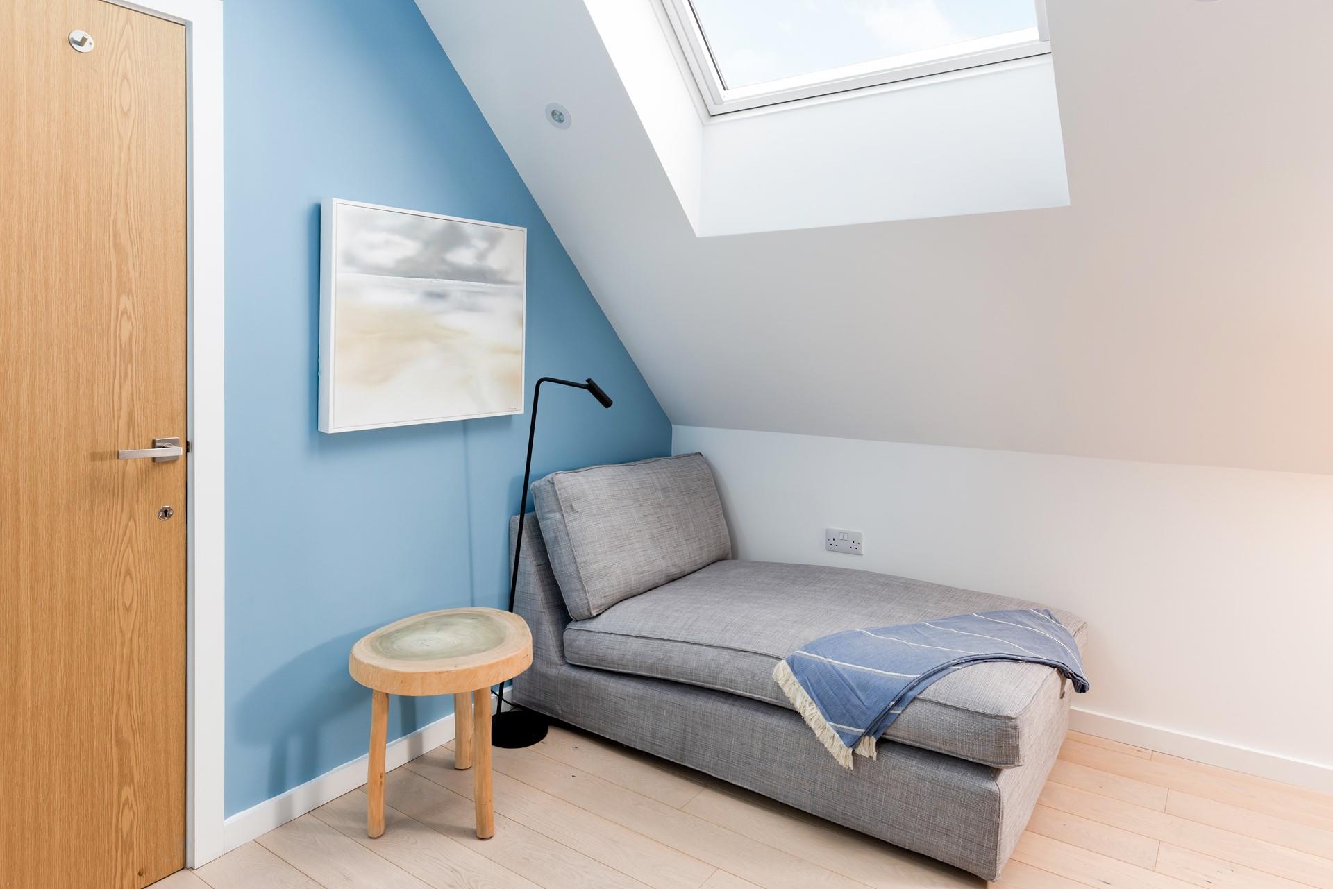 Bedroom 3 has its own reading area with a comfy chaise longue for pure relaxation.