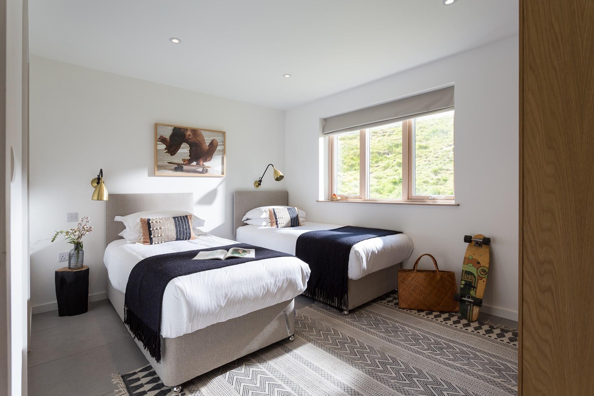 Bedroom 1 is located downstairs and is fully accessible with a walk-in shower wet room.