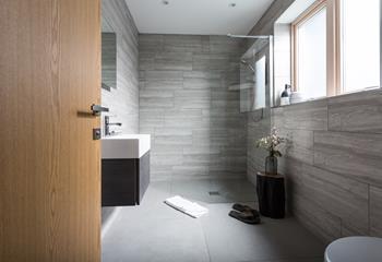 The en suite wetroom offers the perfect space to get ready each morning.