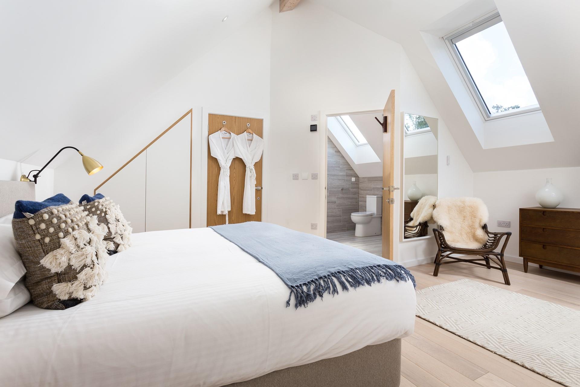 Sink into the spacious king size bed and drift off for a peaceful night's sleep.