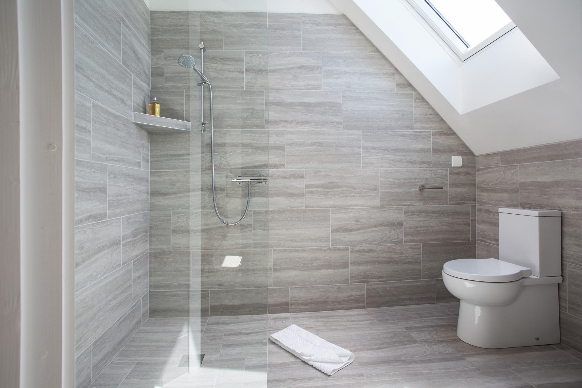 Wander into the en suite and start your day right with a hot shower.
