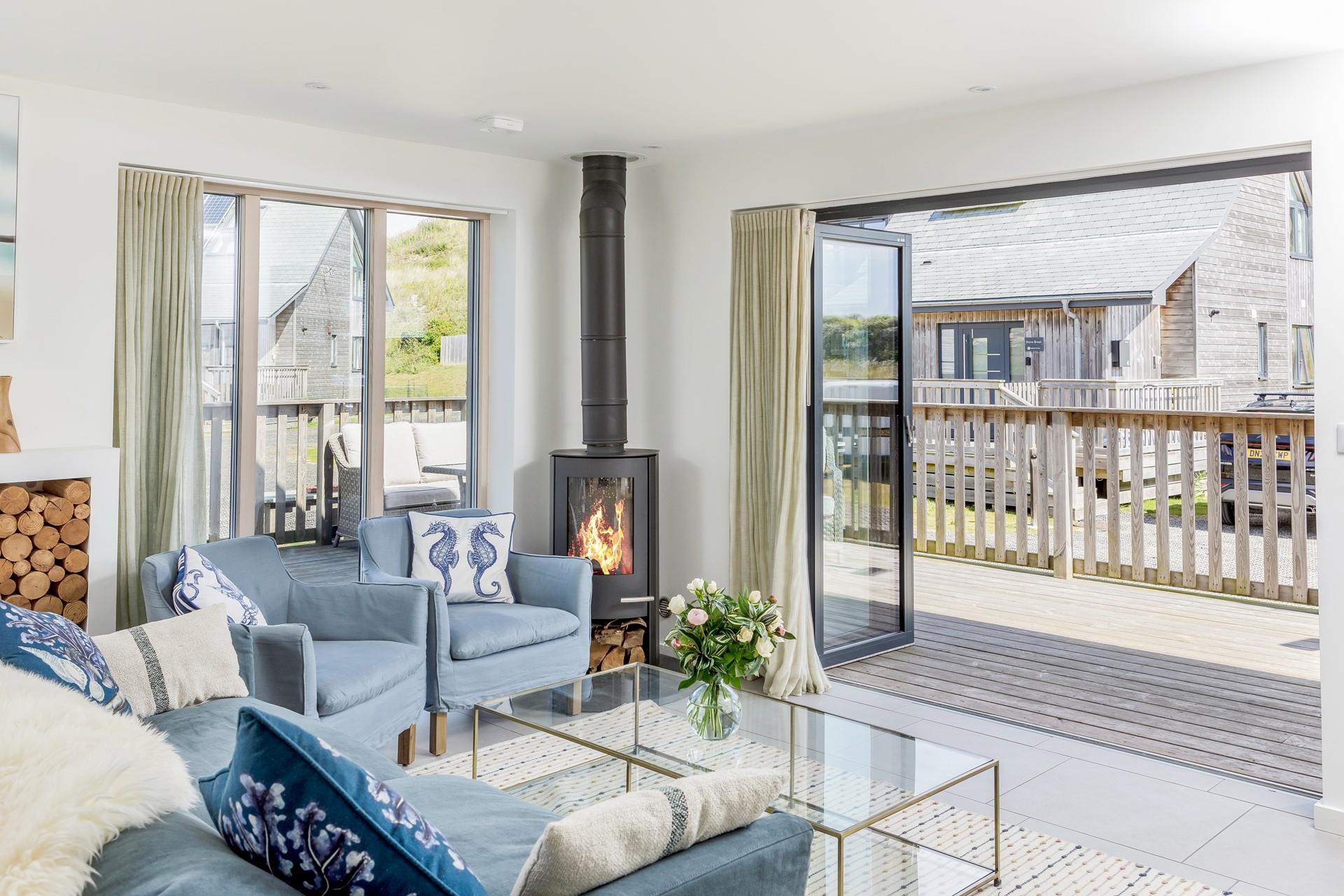 Sit back and relax on the plush sofa in the evening after spending the day on the beach just a few steps away.