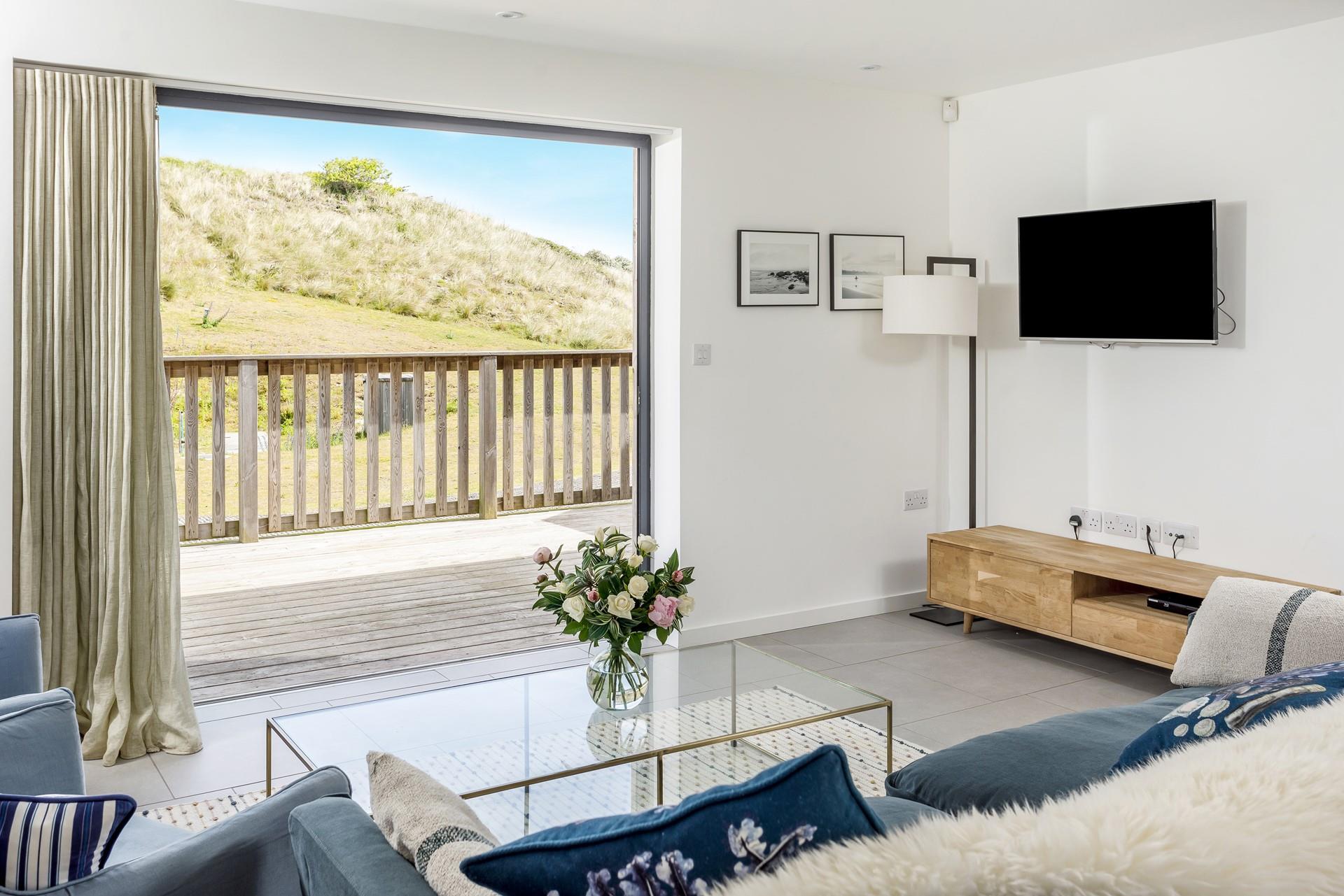 Watch the bunnies in the dunes from your cosy sofa.
