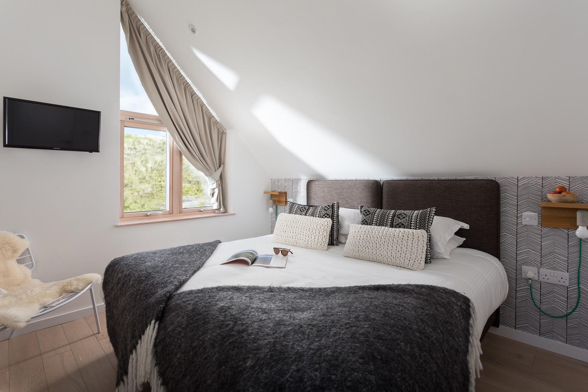 Bedroom 2 has a luxuriously spacious super king size bed.