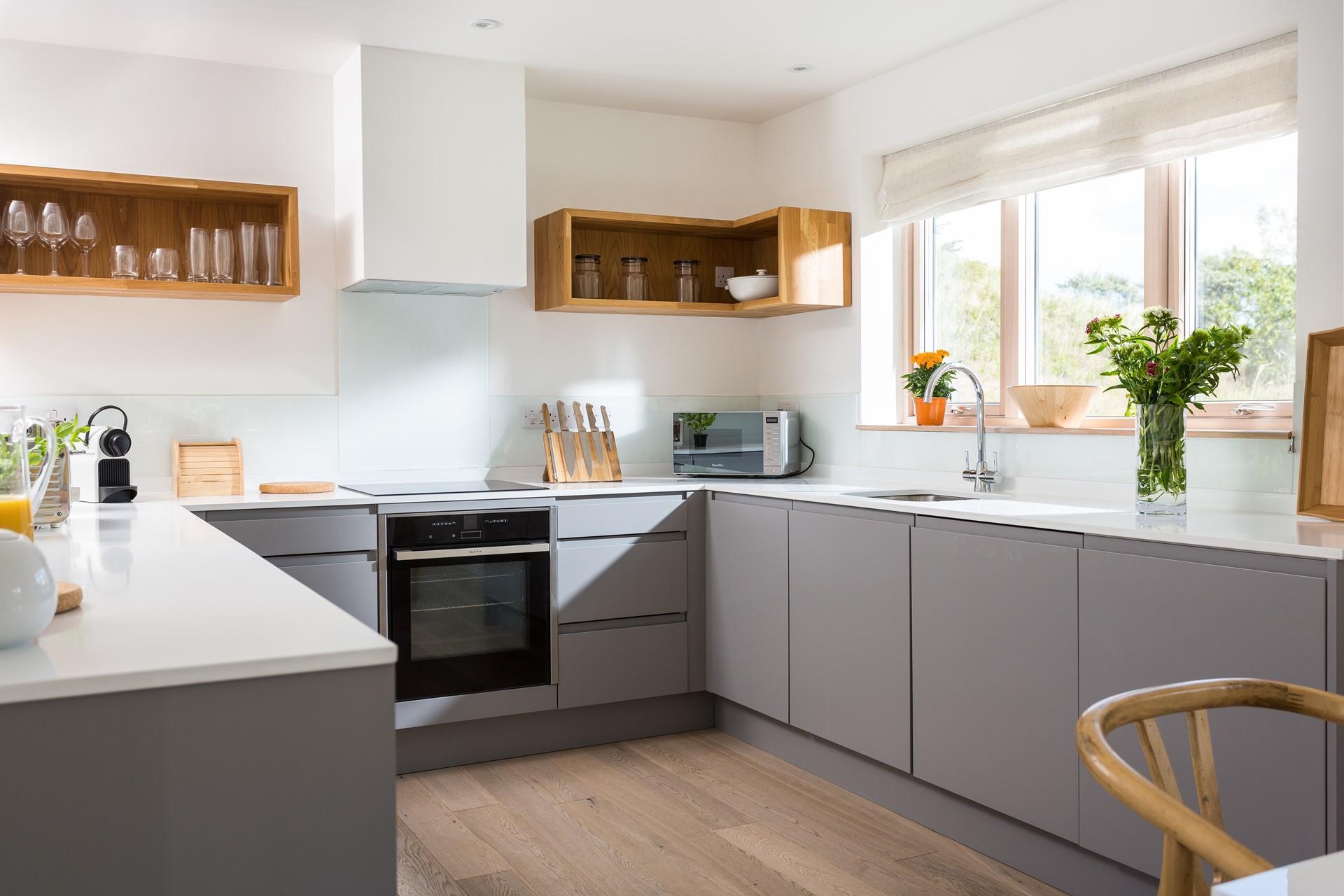 Prepare dinner in the fully equipped and modern kitchen.