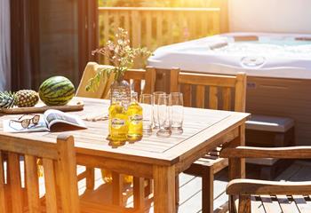 After enjoying a dip in your hot tub, come out for a lazy lunch on the decking.