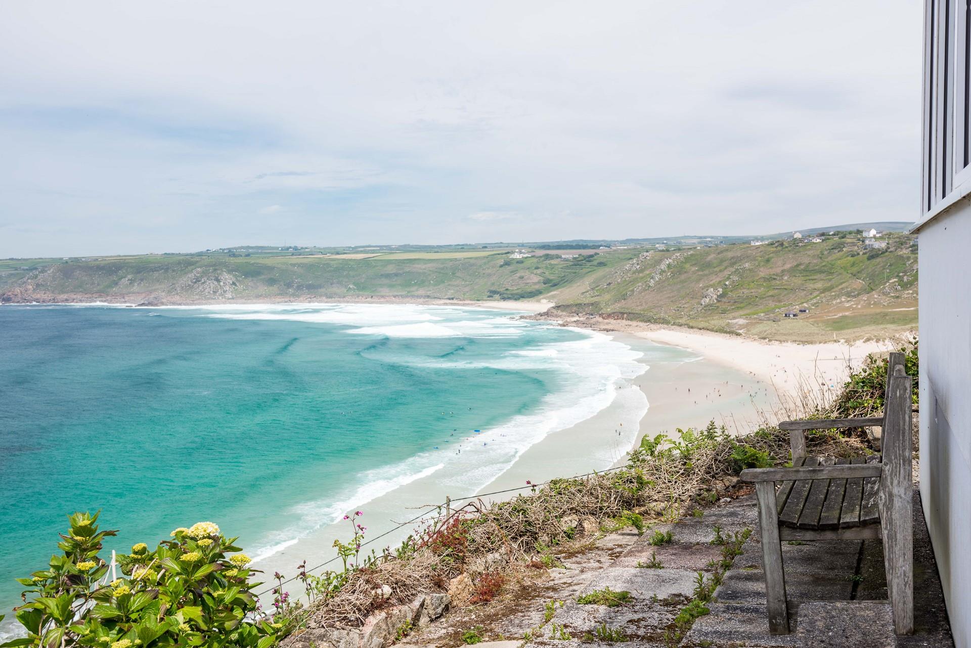 Watch the waves roll onto the shore while you sip a G and T on your patio.